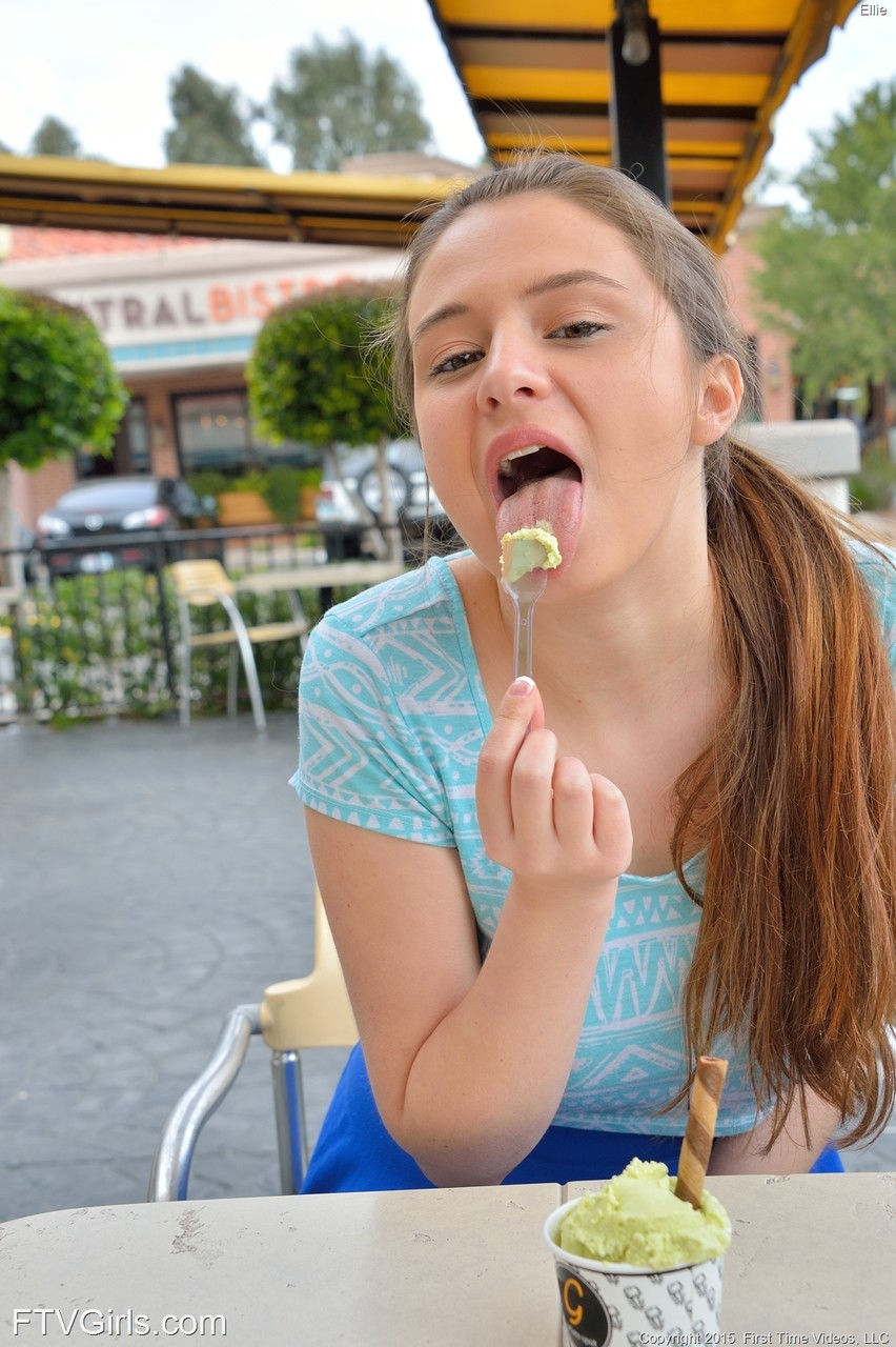 Shady chick Ellie in blue flashes gorgeous breasts on the terrace of cafe