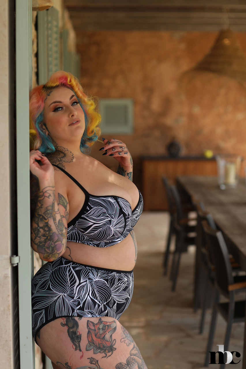 Fatty inked model with colorful hair Galda Lou stripping and posing nude