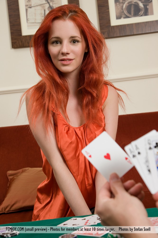 Hot redhead Ariel removes clothes after losing at poker & rolls in the chips