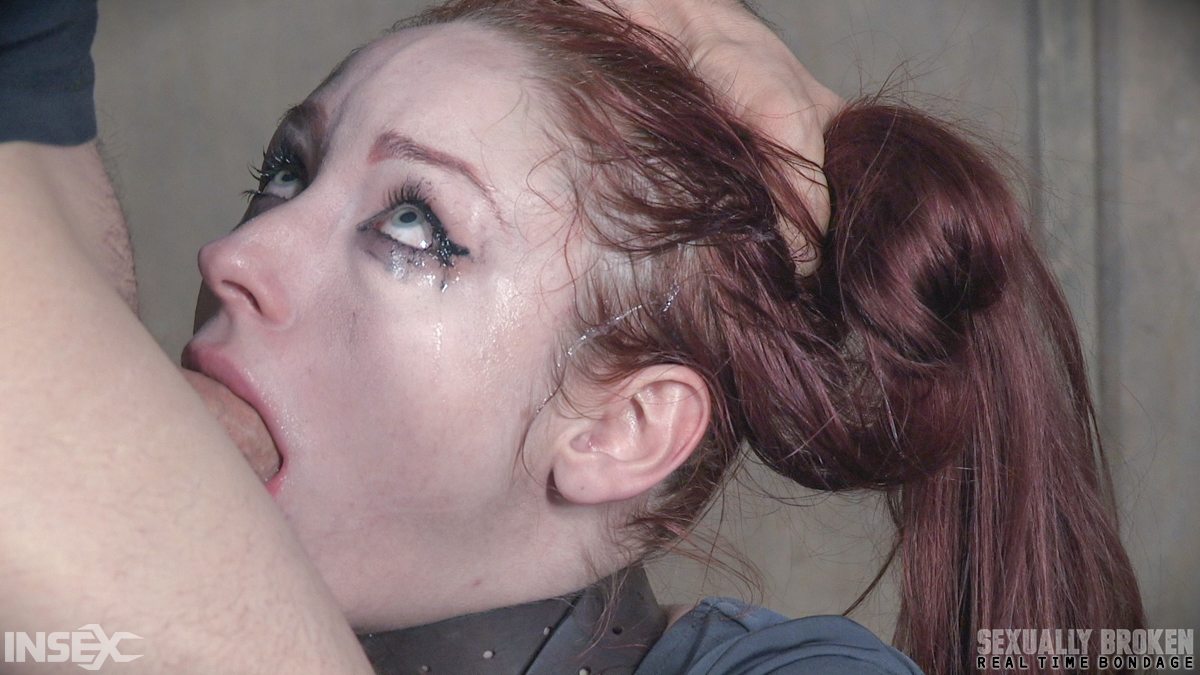 Pale redhead Violet Monroe undergoes a rough throat fucking in dungeon