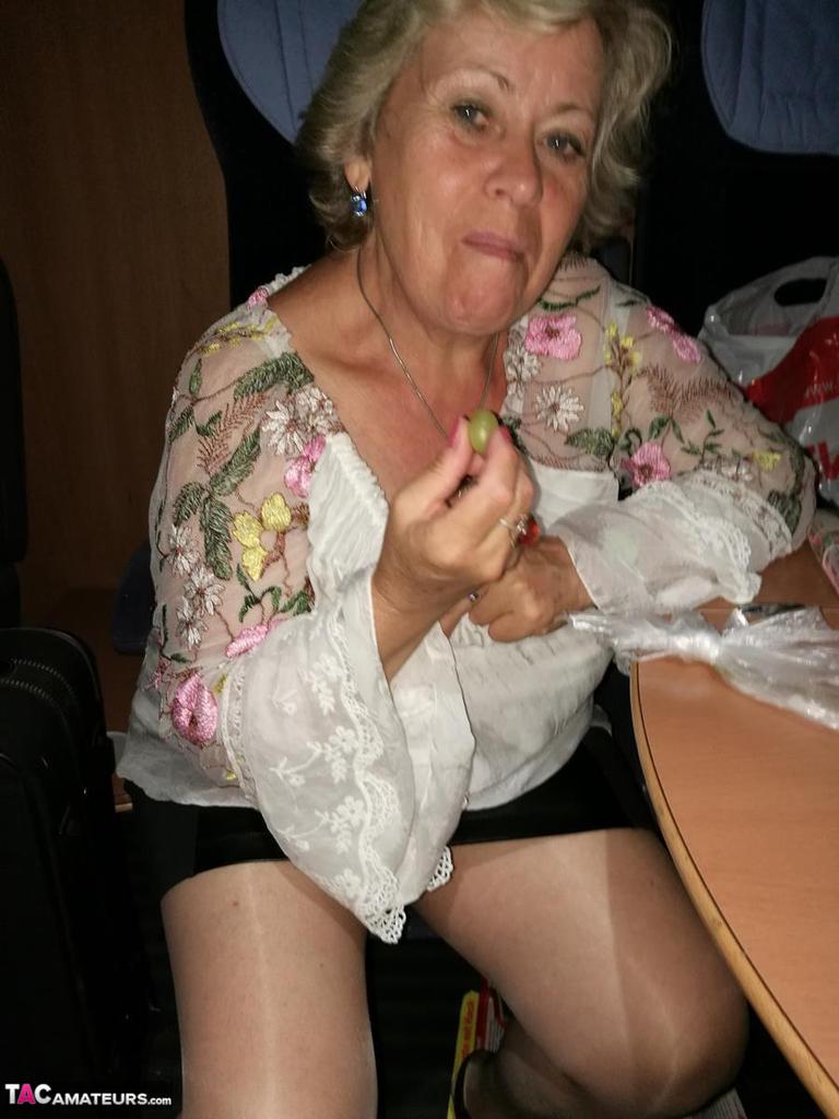 Far grandmother Caro flashes pubic hairs that escape her upskirt underwear