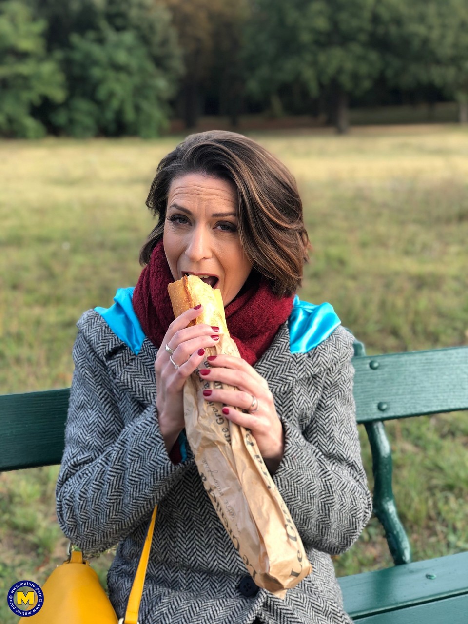 French mom Anya flashes her legs in stockings while eating a sandwich outside