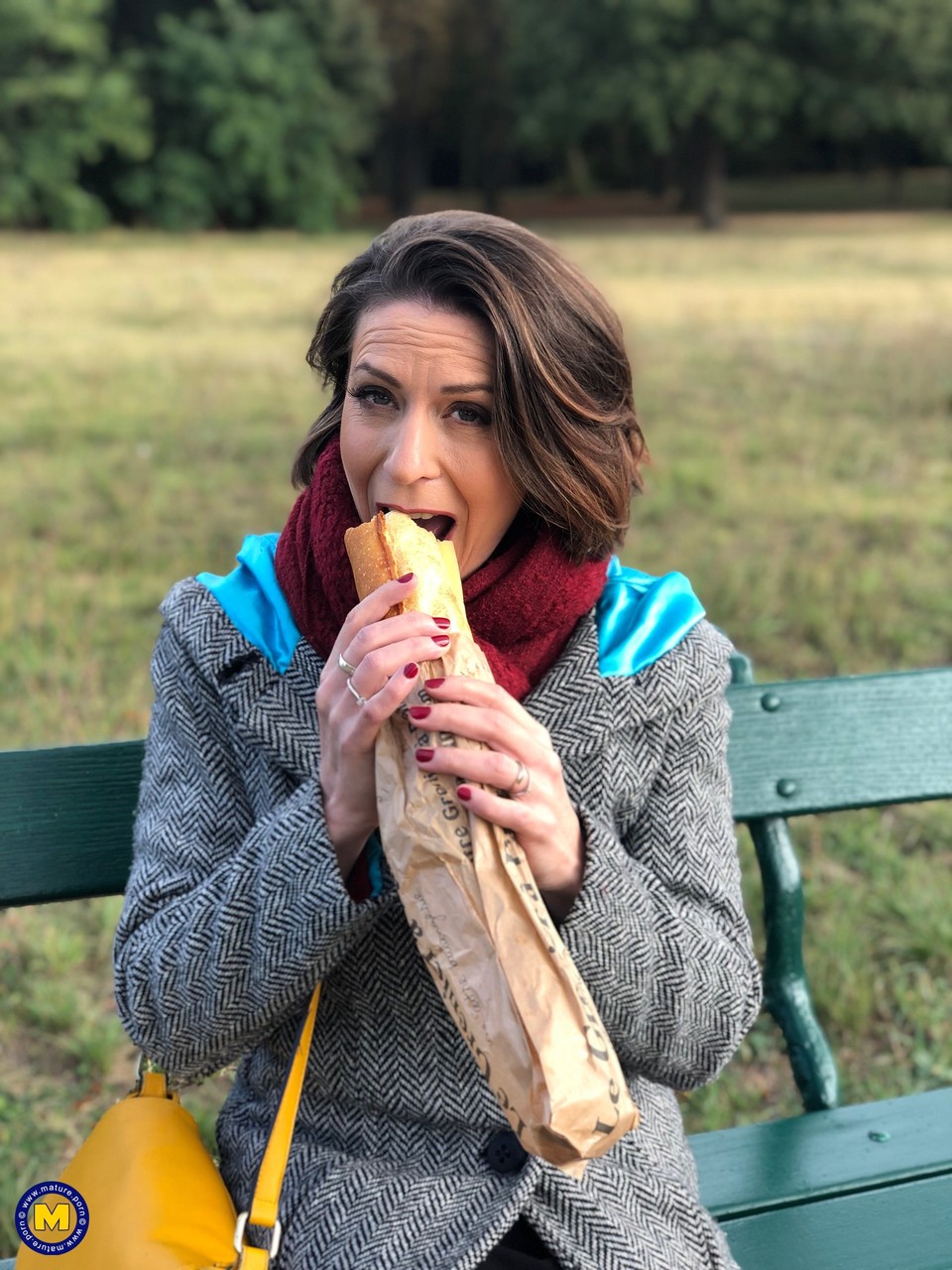 French mom Anya flashes her legs in stockings while eating a sandwich outside