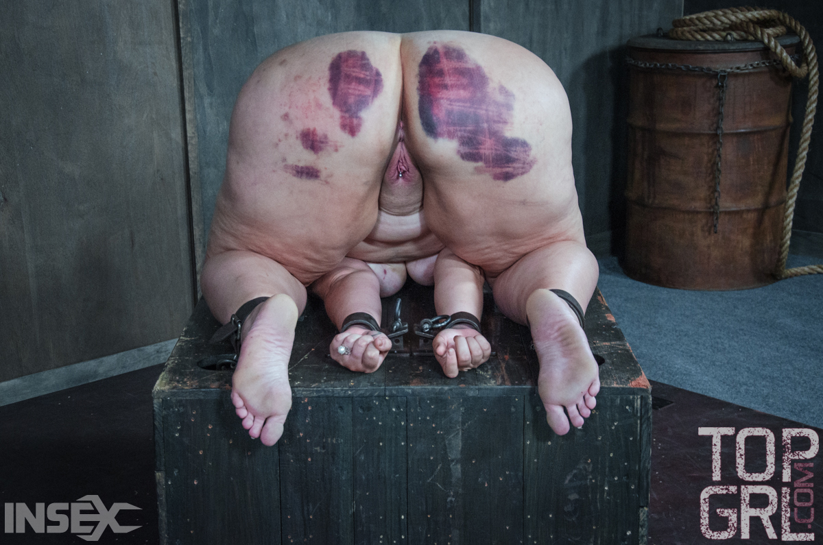 Fat chick undergoes extreme torture session and bruising in a dungeon