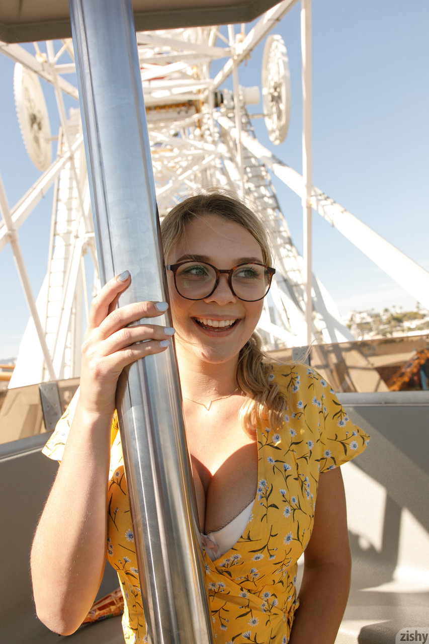 Nerdy amateur babe Gabbie Carter lets out her big tits in at amusement park