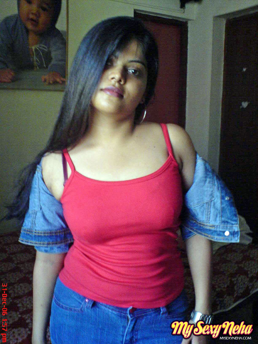 Indian chick Neha uncovers her natural tits during solo action