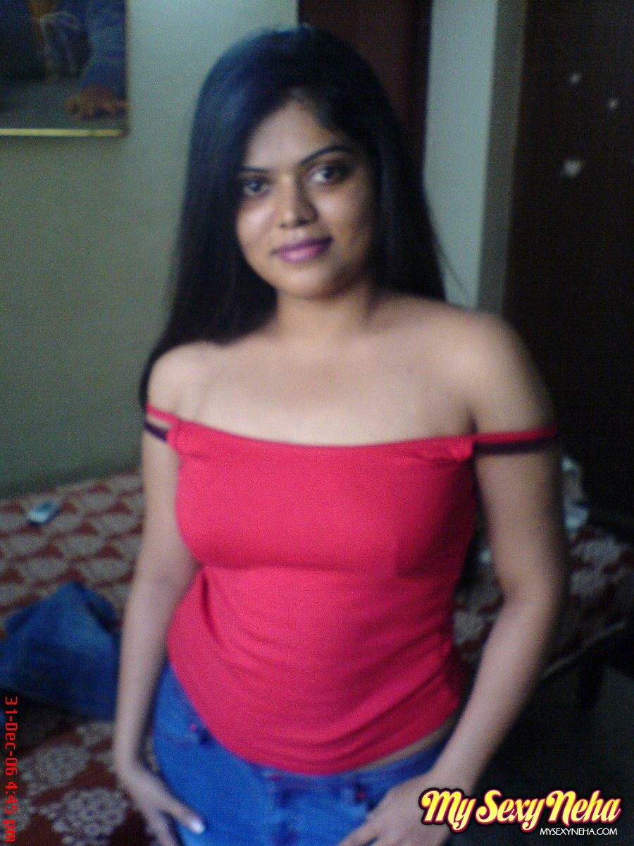 Indian chick Neha uncovers her natural tits during solo action