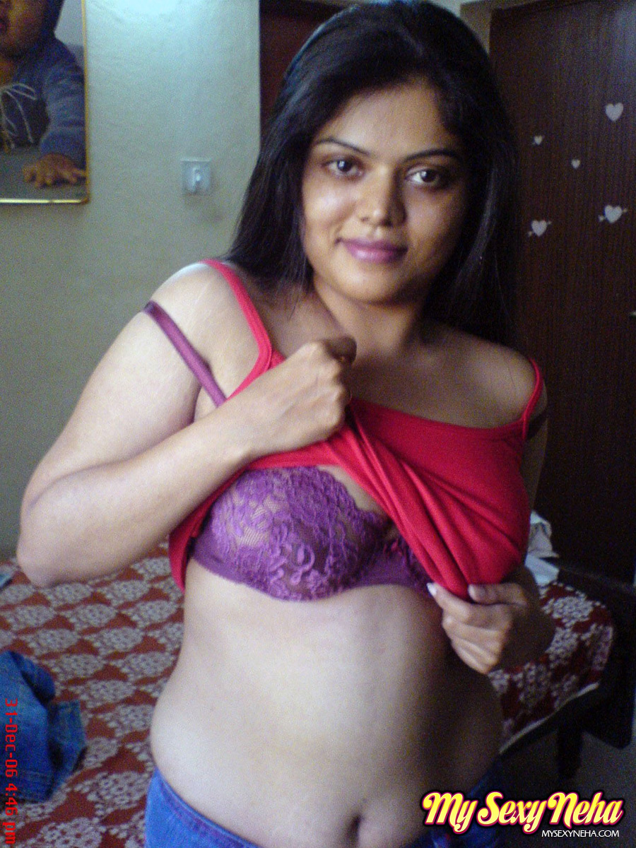 Indian chick Neha uncovers her natural tits during solo action