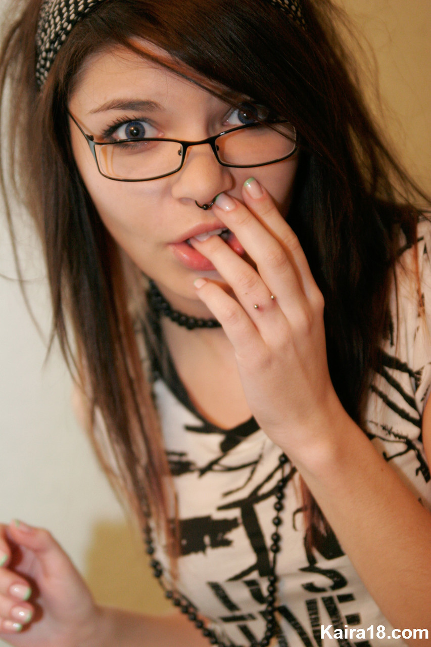 Solo girl Kaira 18 takes off her glasses while fully clothed