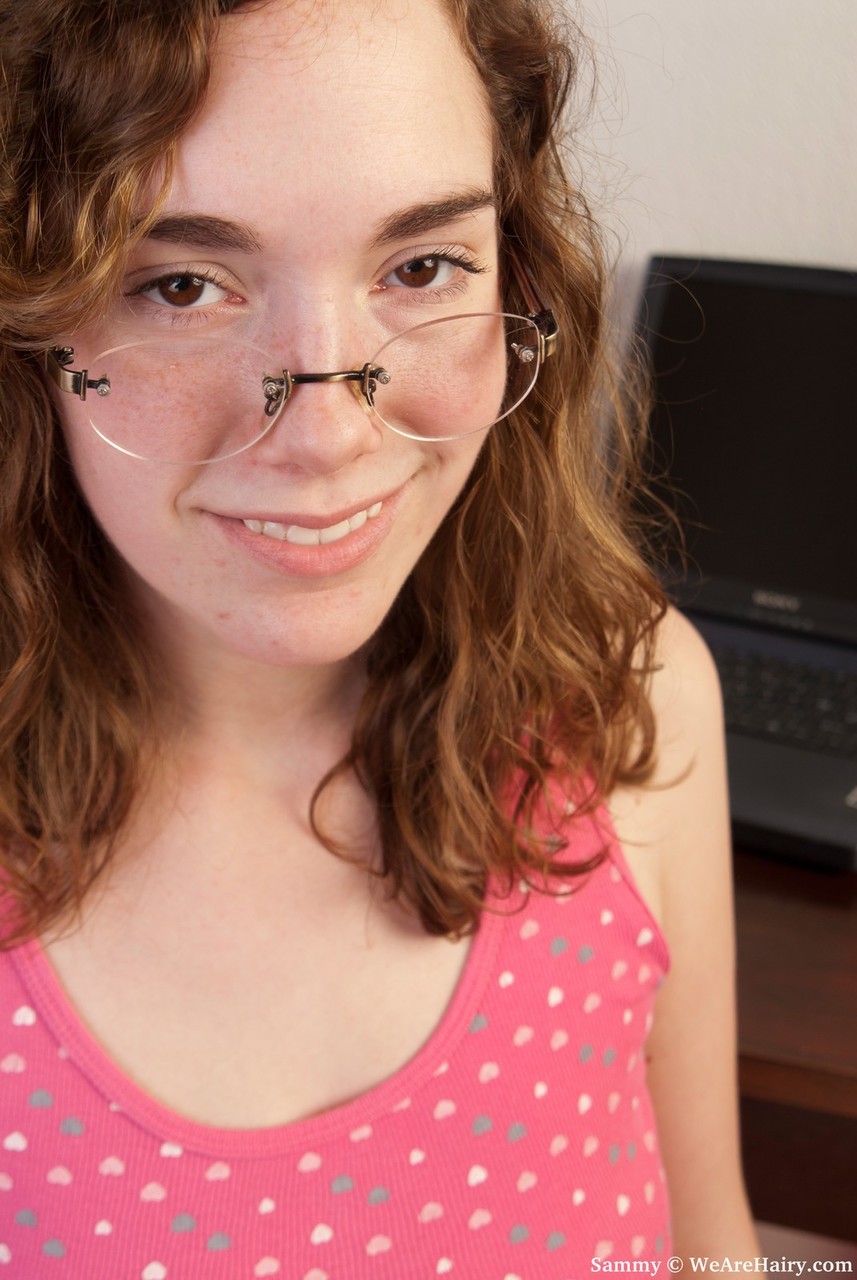 Quiet teen in glasses isn't too shy to show her hairy beaver