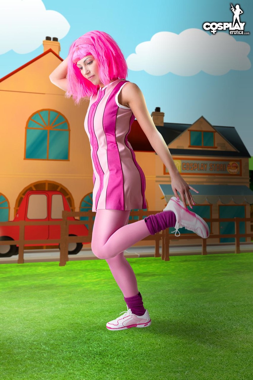 Adorable girl with pink hair Lazy Town exposes her nice body on a lawn