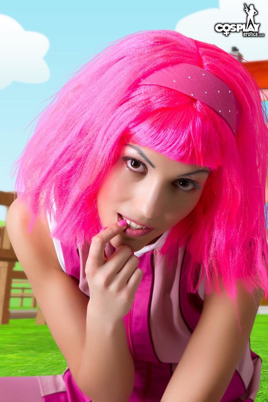 Adorable girl with pink hair Lazy Town exposes her nice body on a lawn