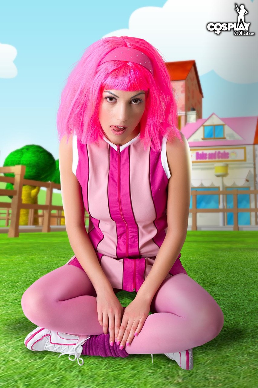 Adorable girl with pink hair Lazy Town exposes her nice body on a lawn