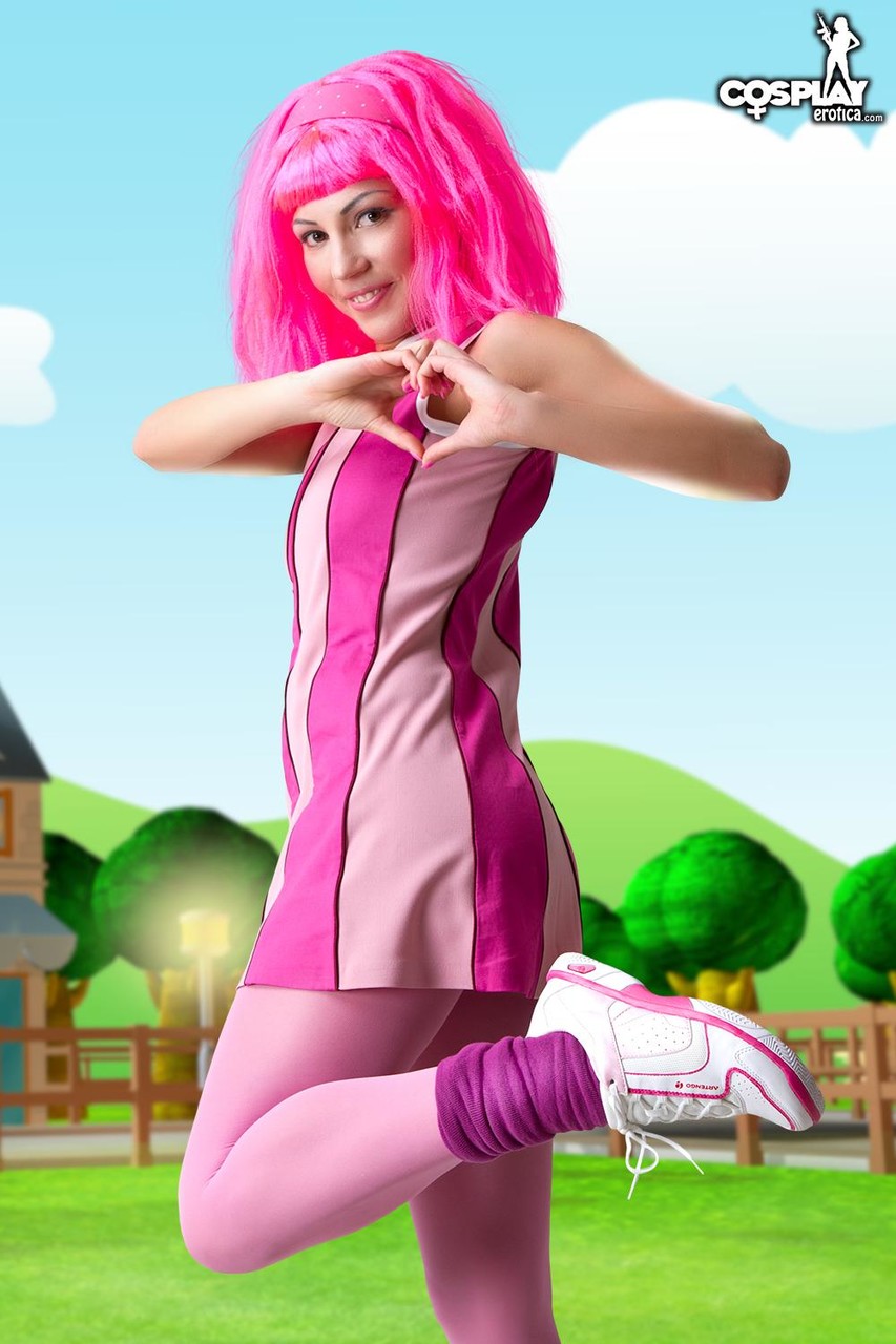 Adorable girl with pink hair Lazy Town exposes her nice body on a lawn